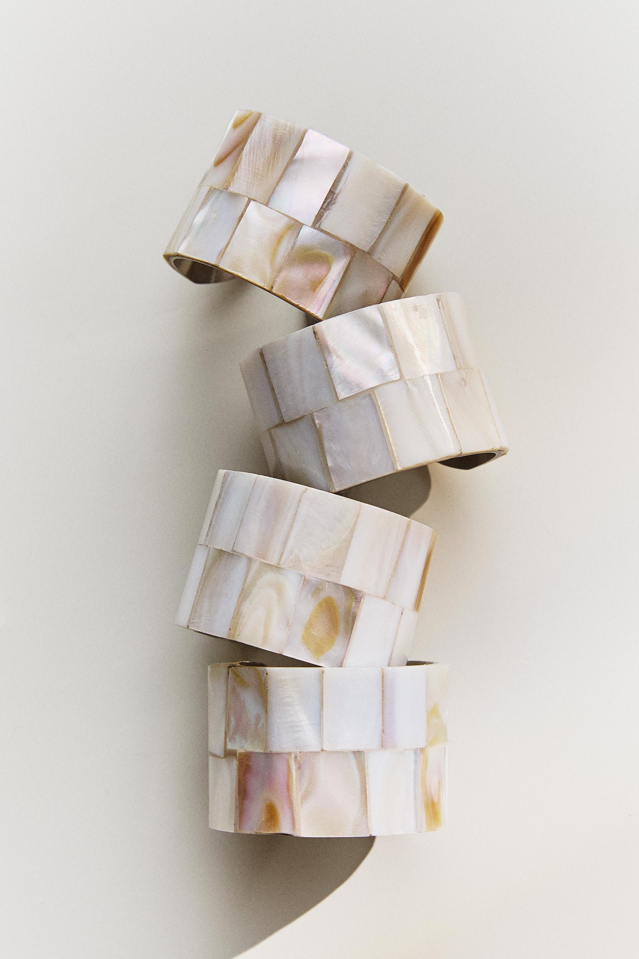SET OF MOTHER-OF-PEARL NAPKIN RINGS (SET OF 4)